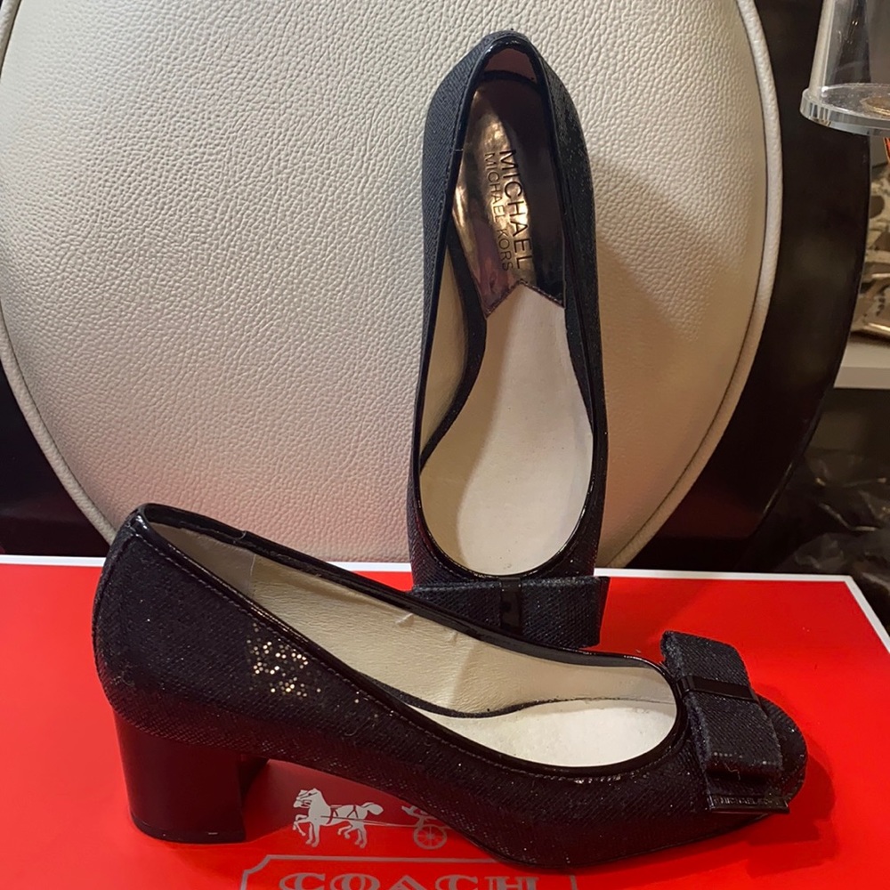 Michael Kors fairly used clean in good condition.
